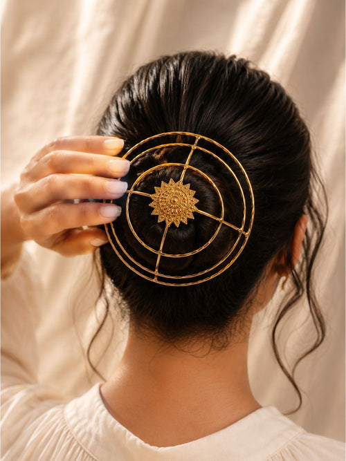 Gold-finish brass sun-design bun cage hair accessory with decorative locking pin