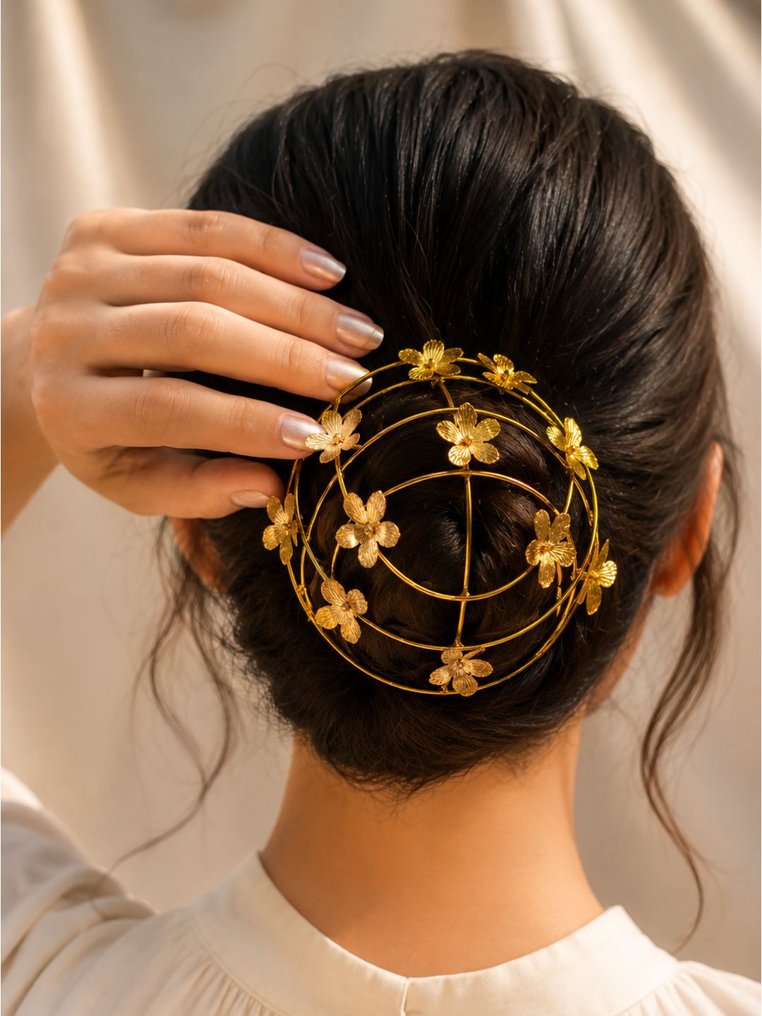 Gold-finish brass butterfly bun cage hair accessory with decorative locking pin