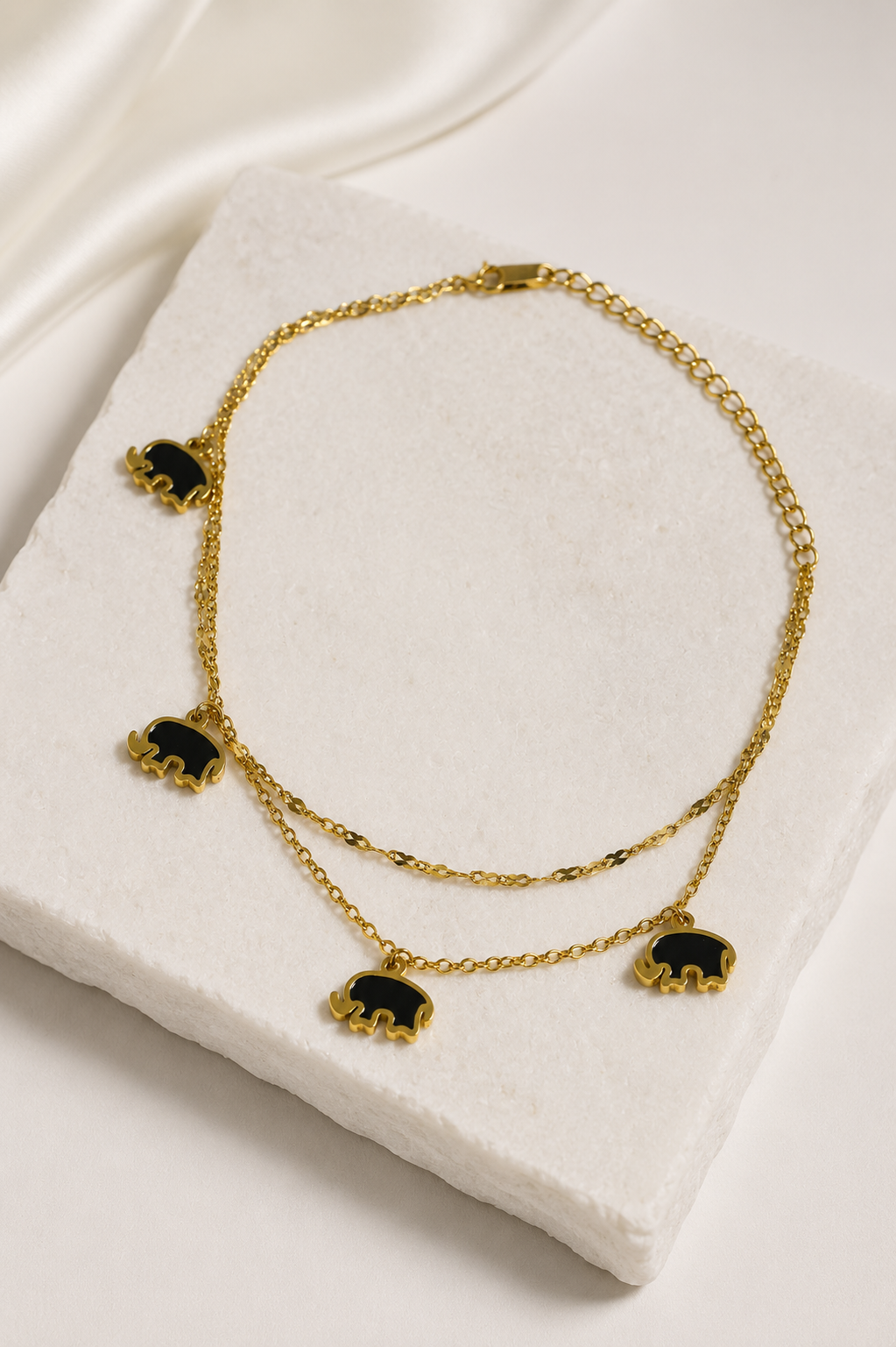 Elephants in a Chain Anklet